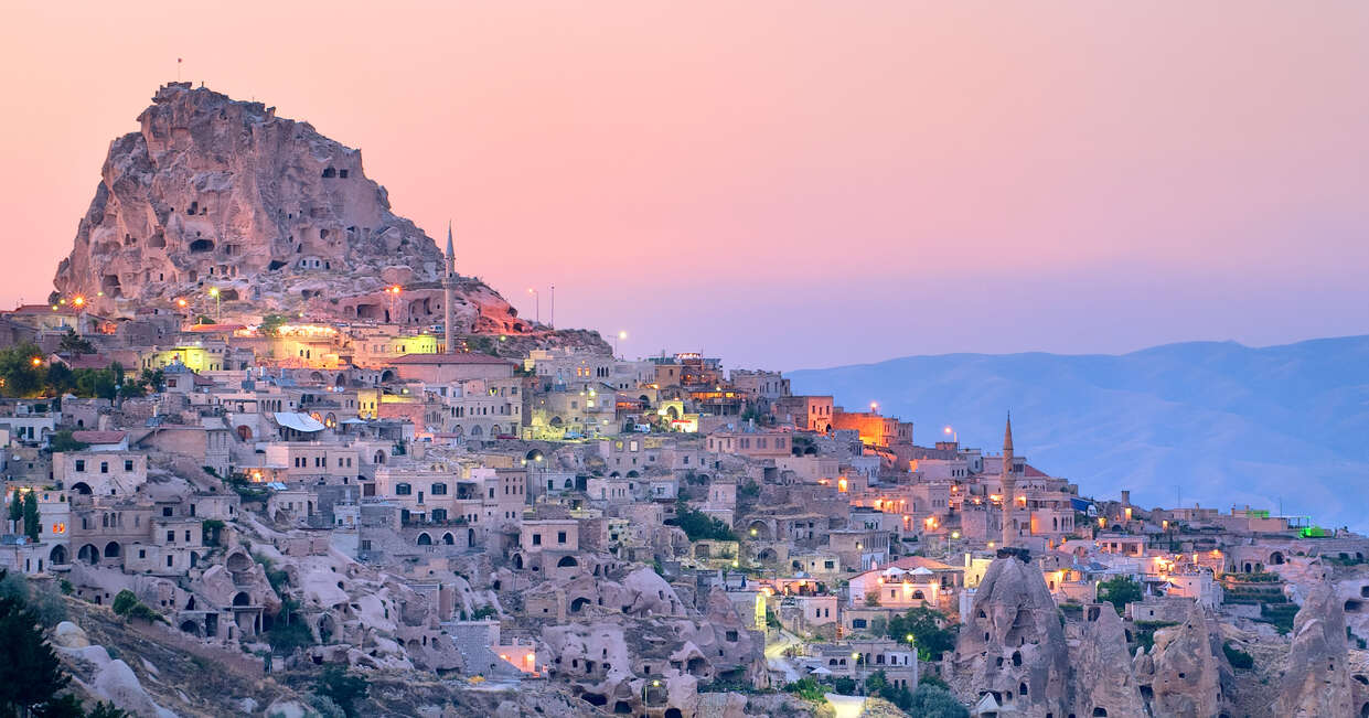 Nevsehir cave city in Cappadocia, at sunset